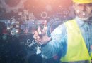 Digital image of construction worker using touch screen showing digital technologies in construction companies