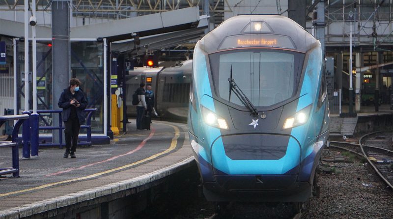 Image of a train pulling into a station in the UK to support Network Rail construction article