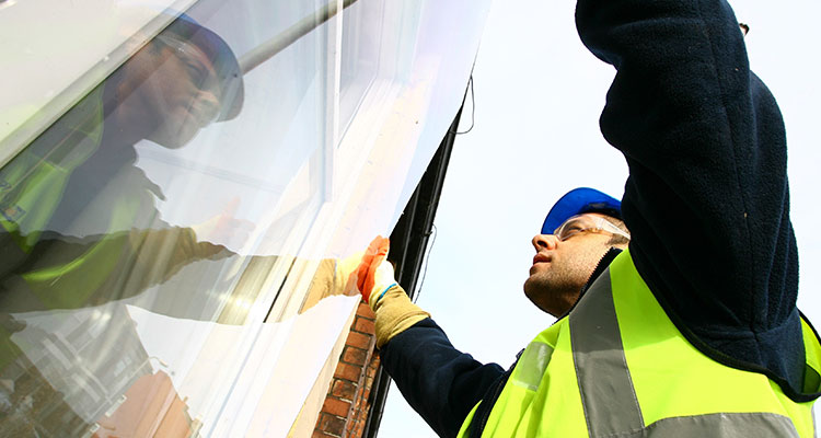 Worker installing Polymer Screen