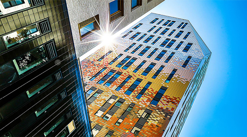 Close-up shot of a modern building on a bright day to support J&B Hopkins article