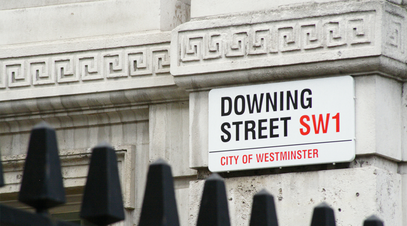 Downing Street sign on side of building in UK to support government funding article