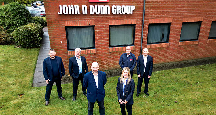 John N Dunn staff outside their headquarters