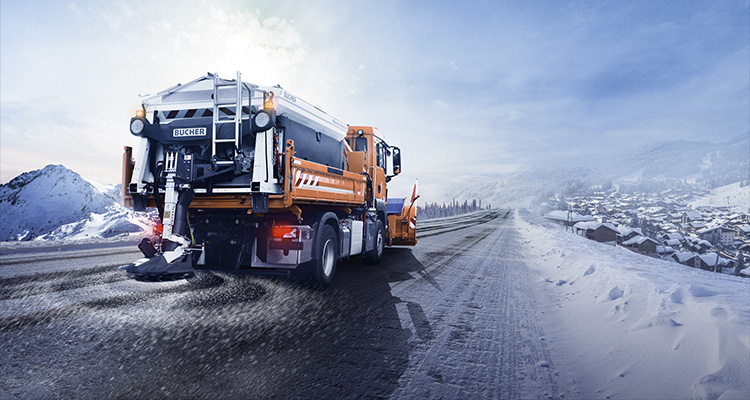 Through cutting-edge technology, Bucher Municipal transforms municipal cleaning with sustainable, future-ready solutions a Bucher Municipal spreader truck, which is used for winter road maintenance