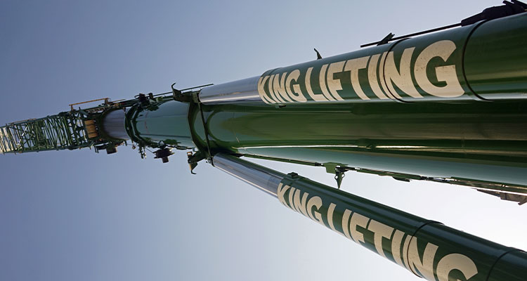 With a young fleet and four decades of reliable service, King Lifting remains a trusted lifting partner for generations he boom of a crane with the logo "KING LIFTING" visible on it