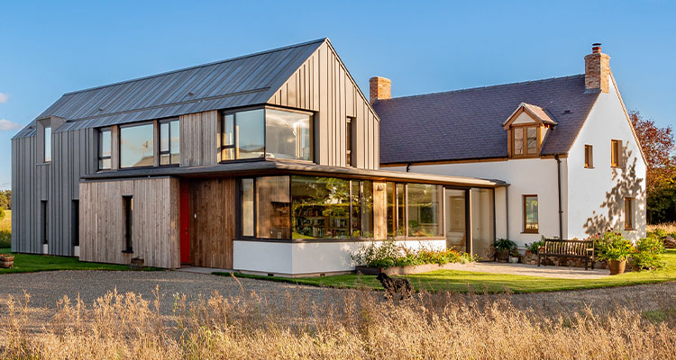Learn how Lowfield Timber Frames promotes sustainability by crafting Passivhaus-ready structures a modern timber-framed house