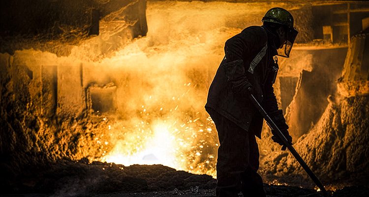 a worker performing ironmaking or steelmaking operations