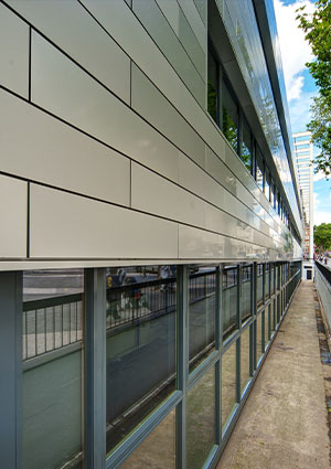 a modern commercial building facade utilizing an Aluminium Rainscreen Overcladding system