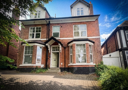 Late Victorian / Early Edwardian semi-detached red brick villa, featuring distinct architectural details popular across the United Kingdom from the late 1880s