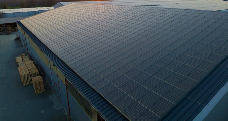 a large-scale commercial roof-integrated (in-roof) solar photovoltaic (PV) system