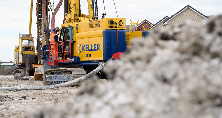 a yellow Keller drilling rig operating on a construction site