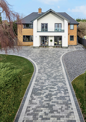 a modern, multi-toned block paving driveway