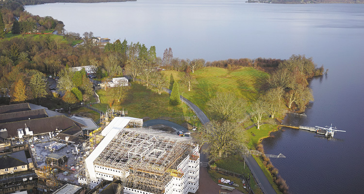 an aerial view of the Cameron House Hotel on the banks of Loch Lomond