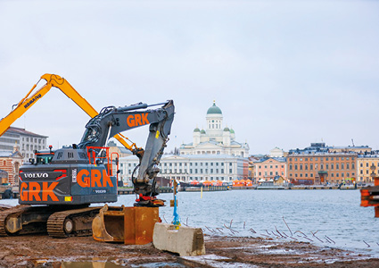 a Volvo crawler excavator operating near the Helsinki Cathedral in Finland