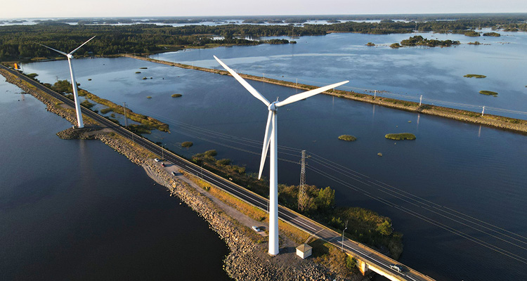 wind turbines installed along a causeway in Finland