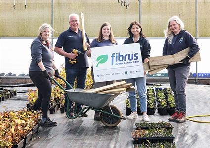 volunteers from full-fibre broadband provider Fibrus and The Conservation Volunteers (TCV) launching Fibrus Green Connections, a £10,000 environmental education partnership