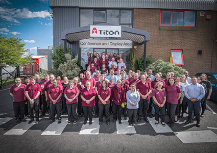 employees of Titon Hardware Ltd outside their manufacturing and research facility on Falconer Road in Haverhill, Suffolk